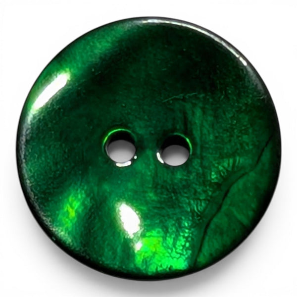 A single round glossy green button with two holes, shown on a white background.