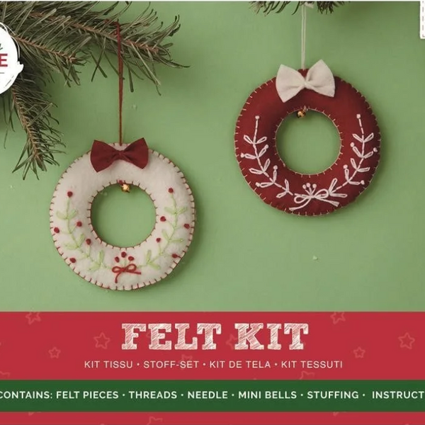 Felt Christmas wreath kit with two wreaths on a green background, featuring Simply Make branding.