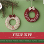 Felt Christmas wreath kit with two wreaths on a green background, featuring Simply Make branding.