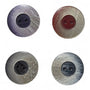 Four plastic buttons with different colors on a white background