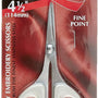 Sewing Wizardscissors packaging with scissors illustration on a red background